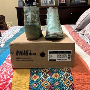 Light turquoise booties from Liberty Black